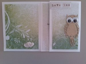 Inside of card, smaller panel closed (2nd owl)